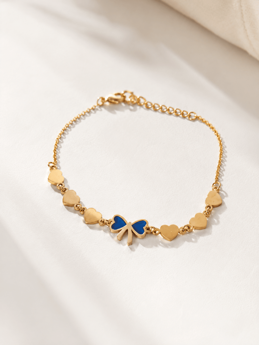 Amora Blue Bow Heart Charm Bracelet – 18K Gold Plated Adjustable Bracelet for Women - Zoene Jewels